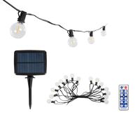 GLOBOSTAR® TWILIGHT 79667 Μοντέρνο Φωτιστικό Κήπου Γιρλάντα 7.7m με 15 Λάμπες & IR Ασύρματο Χειριστήριο LED 9W 810lm 360° DC 3.7V με Ενσωματωμένο Φωτοβολταϊκό Panel 5.5V 1.5W & Επαναφορτιζόμενη Μπαταρία Li-ion 3.7V 1x18650 2200mAh Αδιάβροχο IP65 Θερμό Λευκό 2700Κ Dimmable - Sanan SMD Chip - Μαύρο & Διάφανο - Μ770 x Π4 x Υ7cm - 2 Χρόνια Εγγύηση